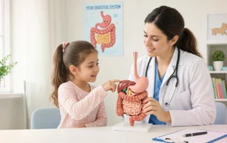 Pediatric digestive health specialist teaching a child about the digestive system while discussing gastrointestinal conditions and treatment in Gainesville, GA.